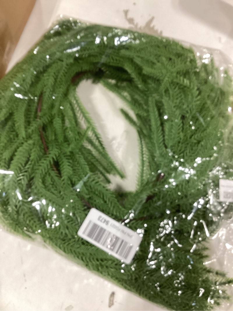 Condition photo showing Good Condition for 9FT Christmas Garland, Artificial Norfolk Pine Garland, Real Touch Greenery, Full & Lush Holiday Decoration for Indoor Outdoor Mantel, Stairway, Doorway & Window
