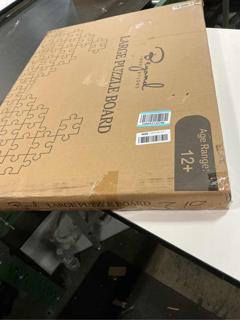 Condition photo showing New/Like New for 1000 Piece Rotating Puzzle Board with Drawers and Cover - 4 Drawers, Wooden Jigsaw Puzzle Table | 30” X 22”| Jigsaw Puzzle Board - Portable Puzzle Tables for Adults and Kids by Beyond Innoventions 1000 Pieces