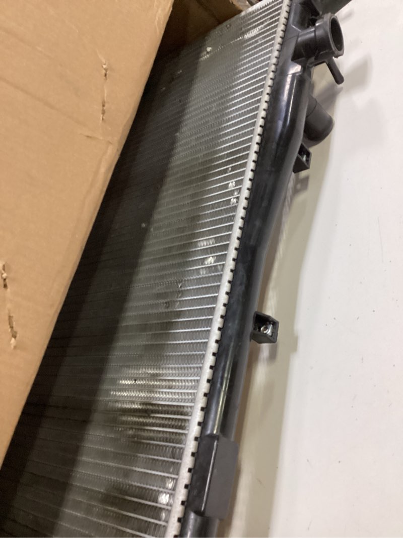 Condition photo showing As Is for dwvo complete radiator compatible with 2001 2002 2003 2004 2005 civic, compatible with 2001-2005 el l4 1.7l dwrd0003 01-05 civic