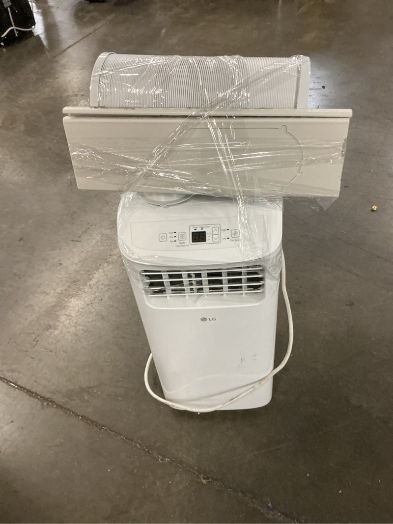 Condition photo showing As Is for 6,000 btu (sacc) / 8,765 btu (ashrae) portable air conditioner | cools up to 250 sq. ft