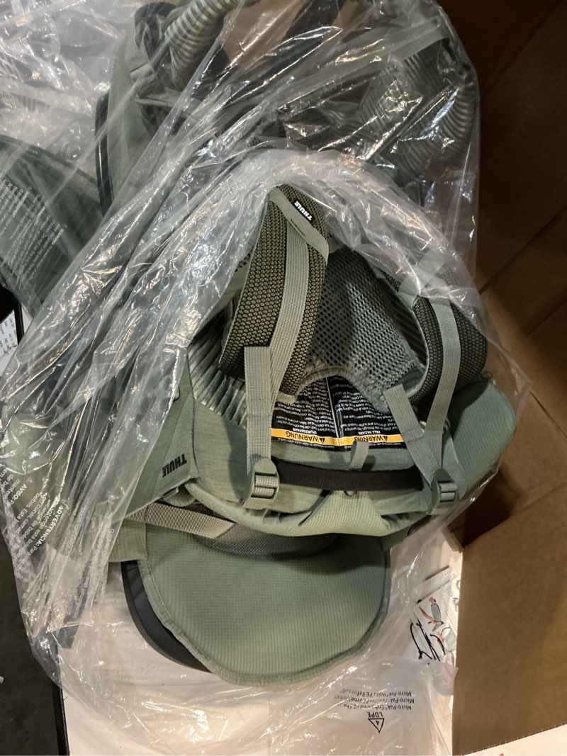 Condition photo showing Good Condition for thule sapling child carrier backpack - machine washable seat - self-standing frame - adjustable padded straps for parents - ergonomic seat with under-leg support for child - upf 50 sunshade agave