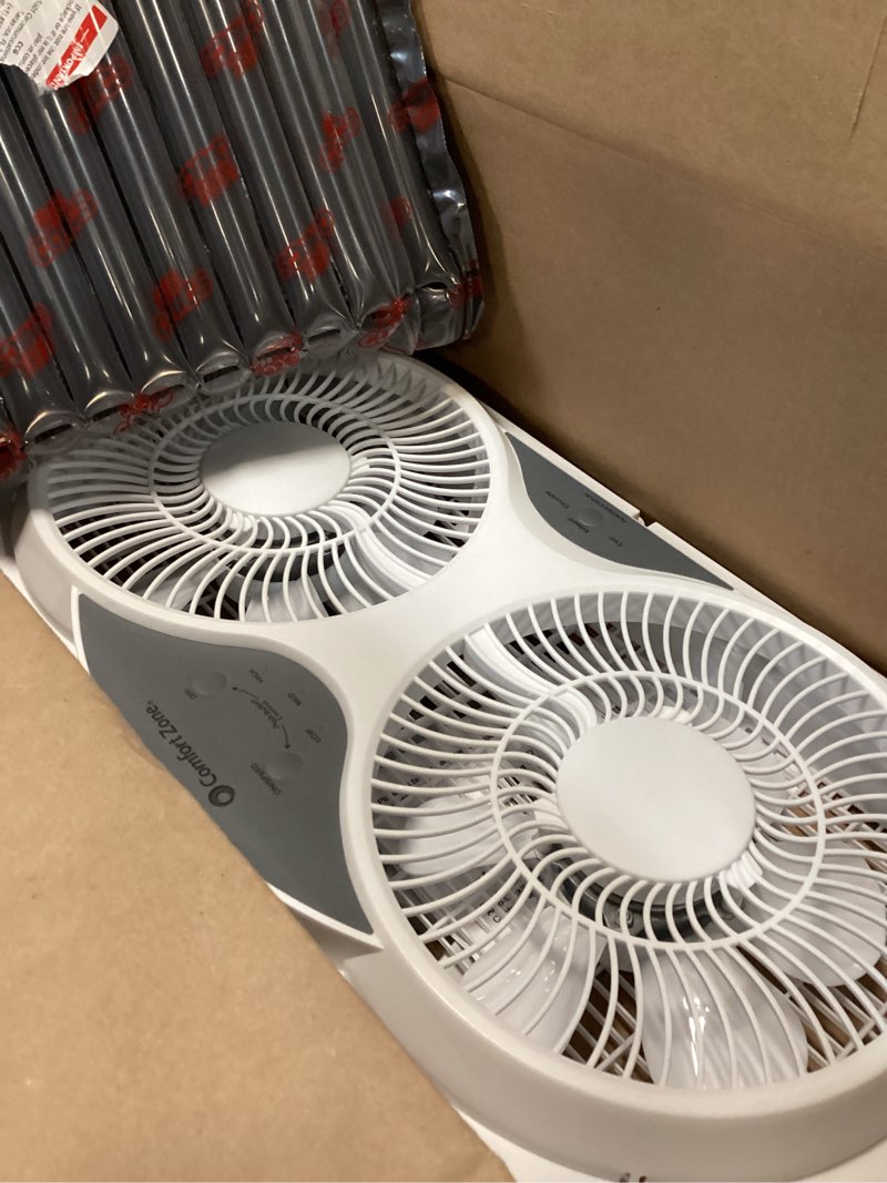 Condition photo showing As Is for comfort zone 9   reversible twin window fan with remote control  white