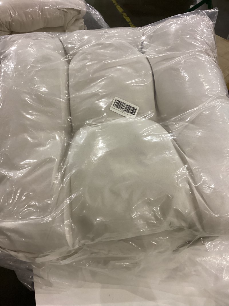 This is a set of new Pottery Barn Tufted Outdoor Dining Chair Cushions in the color natural.  