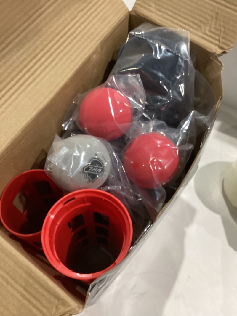 Condition photo showing Good Condition for Franklin Sports NHL Automatic Mini Hockey Ball Passer - Knee Hockey Ball Passer Includes (6) Mini Balls - NHL Licensed One Size