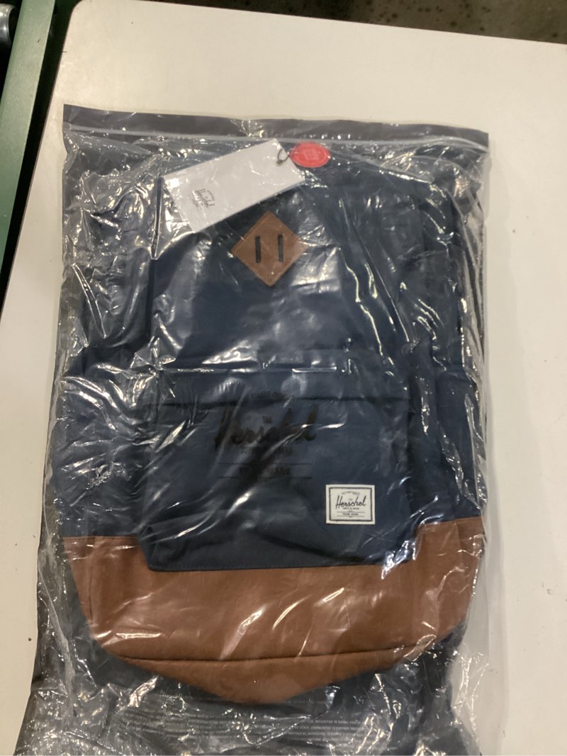 Condition photo showing New/Like New for heritage canvas backpack - navy