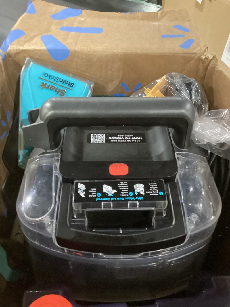 Condition photo showing As Is for not tested shark stainstriker portable carpet & upholstery cleaner w/on board self cleaning - spot, stain, & odor eliminator, includes 2 cleaning tools & 2 cleaning solutions, charcoal, px221brn stainstriker w/ onboard self-cleaning