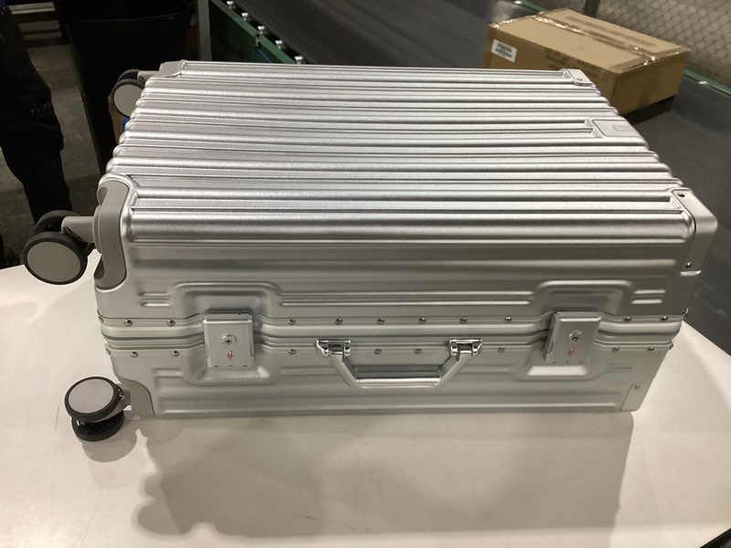 Condition photo showing As Is for *similar to stock* luggex carry on luggage with aluminum frame, polycarbonate zipperless luggage with wheels, hard shell suitcase 4 metal corner (sky blue)