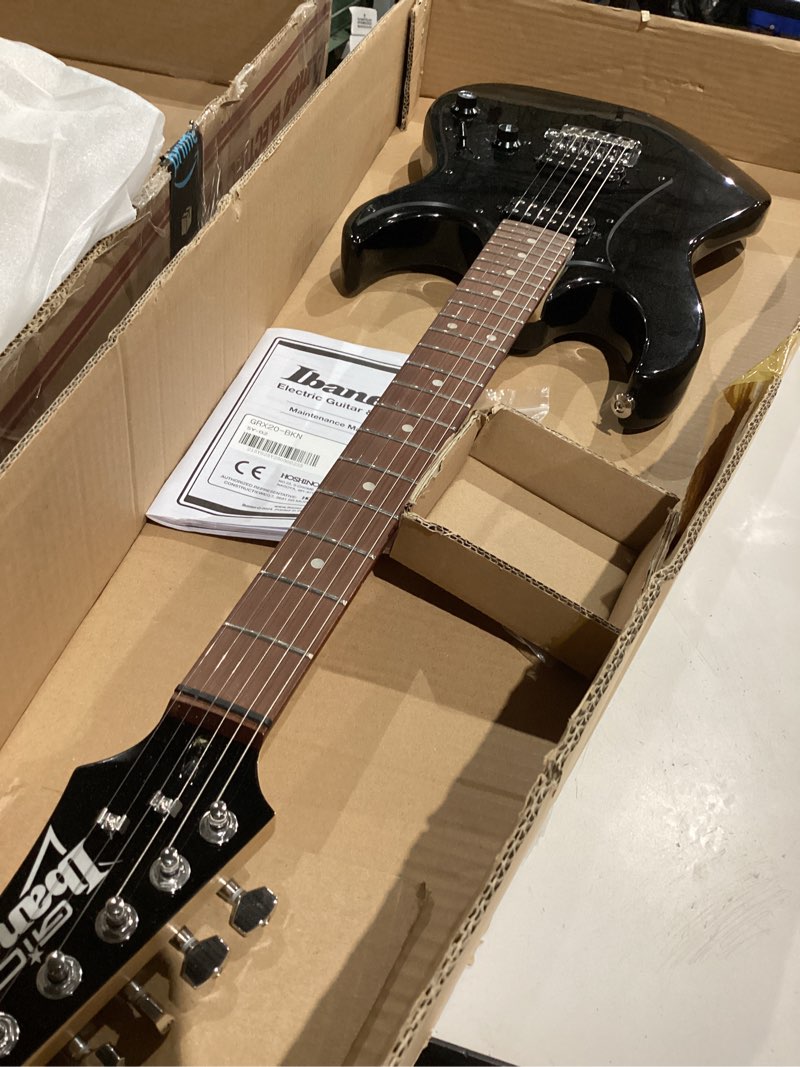 Condition photo showing Good Condition for ibanez grx20z rg gio electric guitar - black night bundle with amp, gig bag, tuner, instrument cable, picks, austin bazaar instructional dvd, and polishing cloth grx20z - black night bundle w/ amp