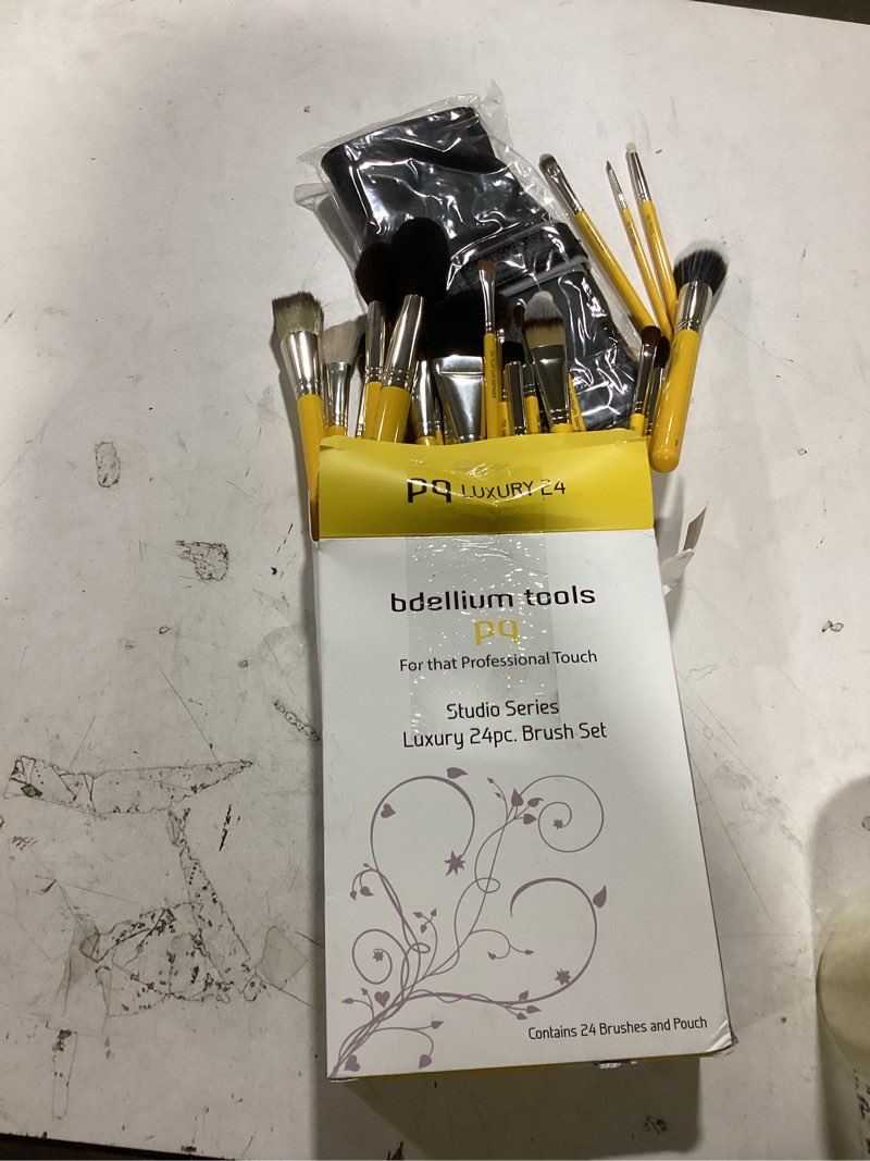 Condition photo showing As Is for Bdellium Tools Studio Series Luxury 24pc. Brush Set, which includes 24 brushes and a storage pouch. 