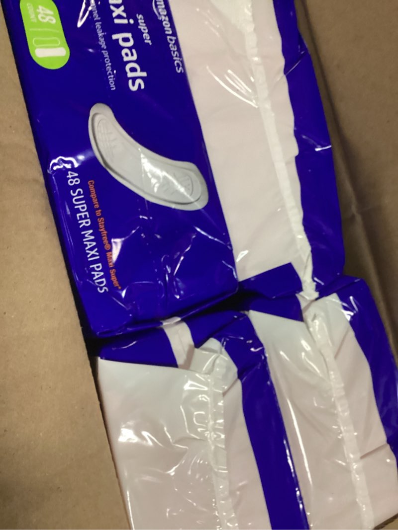 Condition photo showing New/Like New for amazon basics maxi pads for periods- thick, super absorbency, unscented, 192 count, (4 packs of 48) super 192.0