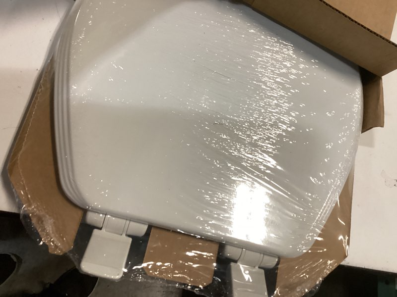 Condition photo showing New/Like New for bemis ashland modern wood toilet seat with decorative edge, slow close, secure hinges, made in usa, round, white
