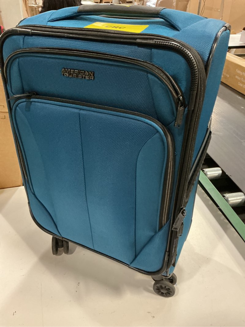 Condition photo showing As Is for american tourister phenom softside large checked spinner suitcase - blue: 4-wheel travel bag