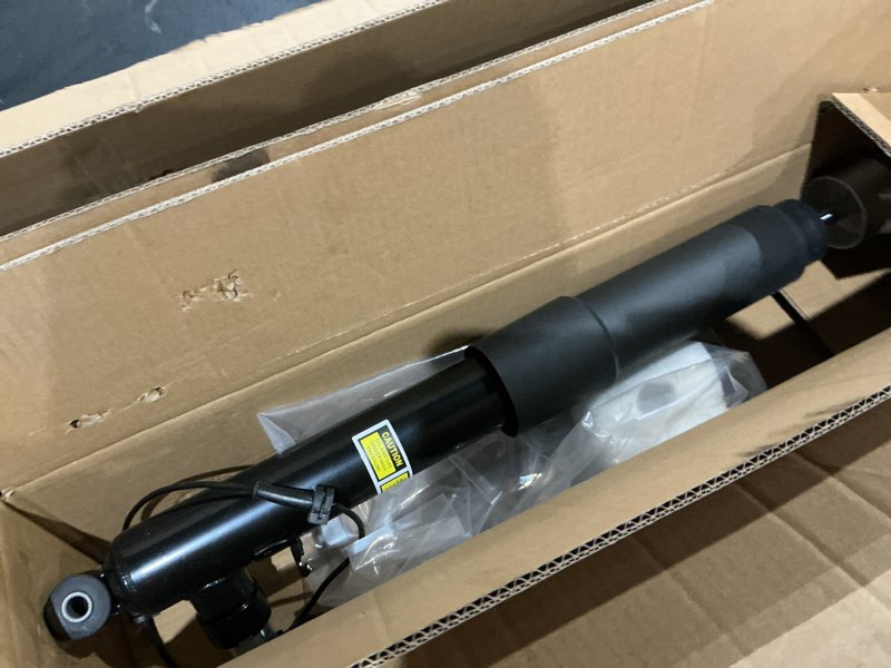 Condition photo showing As Is for pair rear left right air suspension shock absorber struts w/electric compatible