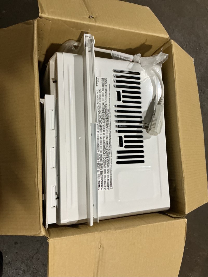 Condition photo showing As Is for 6,000 btu 115-volt window air conditioner cools 250 sq. ft. with remote, dehumidifier, and wi-fi enabled