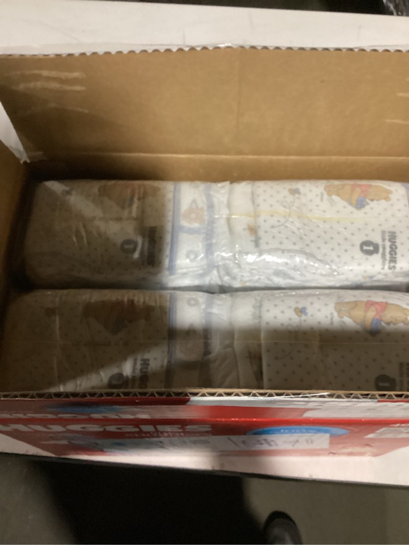 Condition photo showing Good Condition for Huggies Size 1 Diapers, Little Snugglers Baby Diapers, Size 1 (8-14 lbs), 96 Count, Packaging May Vary Size 1 96