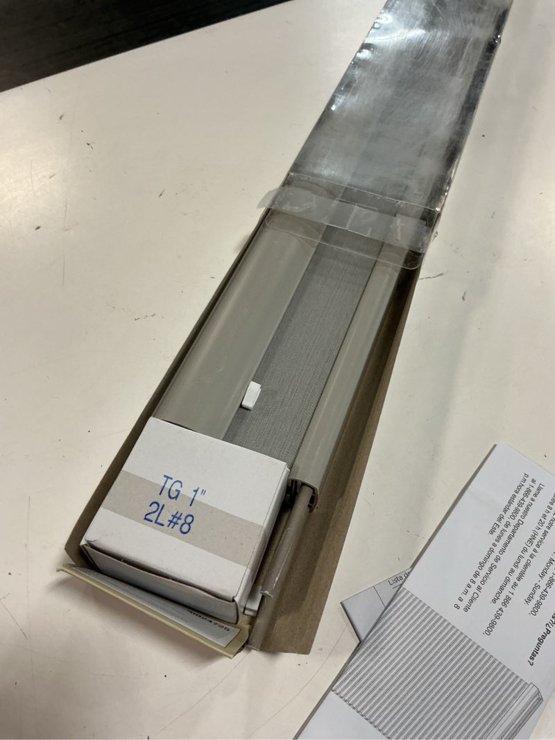 Condition photo showing As Is for allen + roth 34-in x 72-in gray light filtering cordless cellular shade