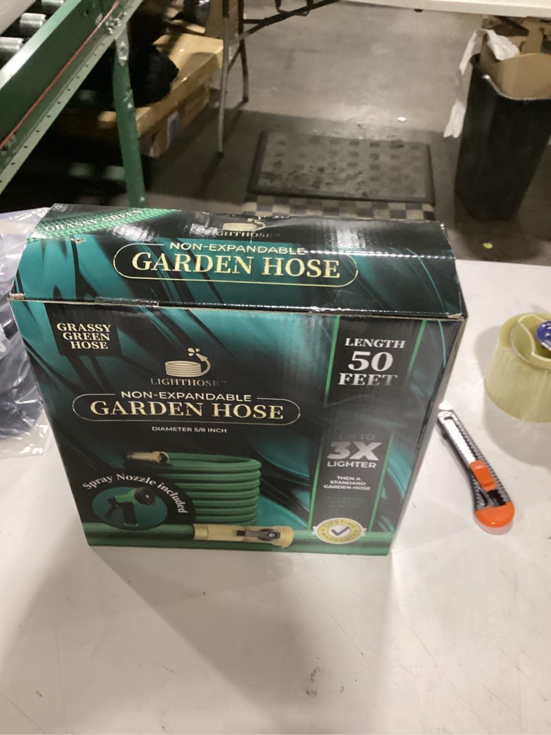 Condition photo showing New/Like New for garden hose, non-expandable garden hose, super light weight hose, no burst, 3/4 inch solid brass connectors, 50 ft, grassy green 50 feet grassy green