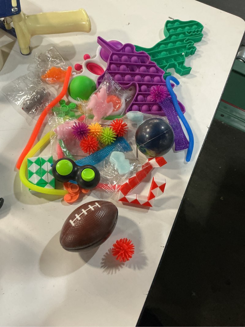 Condition photo showing As Is for fidget poppers pack – 50 pcs fidget toys, party favors for kids 8-12, stocking stuffers, bulk sensory toys for classroom treasure box prizes, goodie bags, birthday gifts