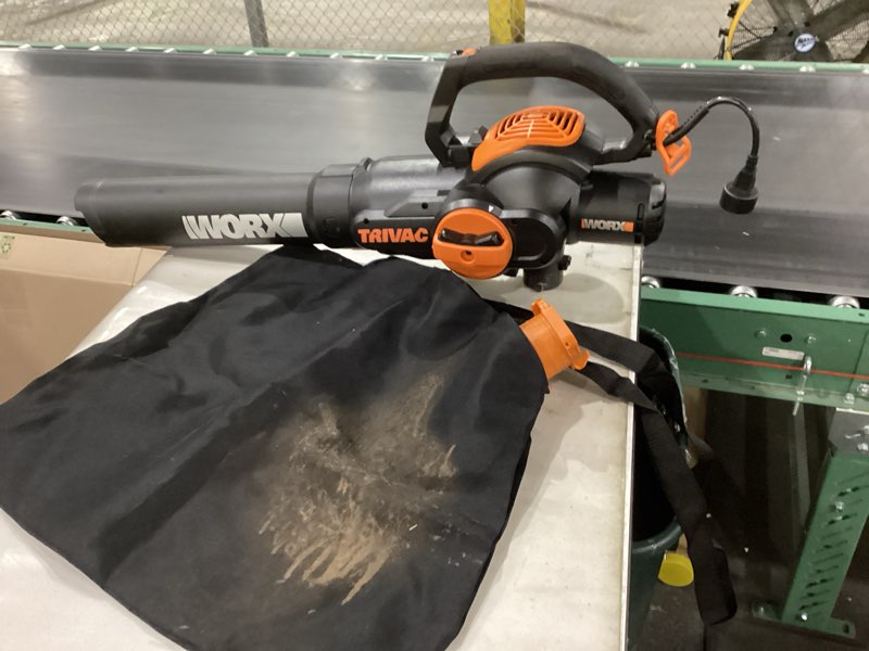 Condition photo showing As Is for WORX 12 Amp Trivac 3-in-1 Electric Leaf Blower/Mulcher/Yard Vacuum - WG512
