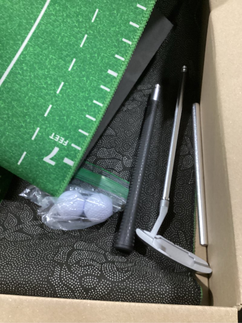 Condition photo showing Good Condition for wekin indoor putting green game set, golf putting game with metal putter & golf balls, golf putting mat training aid for backyard,party,office 8.5 feet putting mat