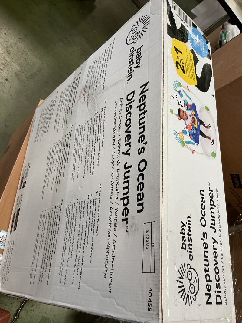 Condition photo showing New/Like New for Baby Einstein Neptune's Ocean Discovery Activity Jumper, Ages 6 months +, Max weight 25 lbs., Unisex