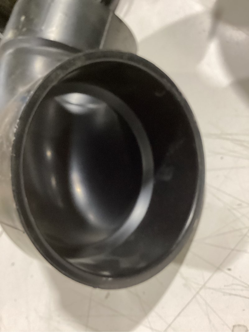 Condition photo showing As Is for 4 in. x 4 acrylonitrile butadiene styrene (abs) dwv 90-degree hub x hub elbow fitting