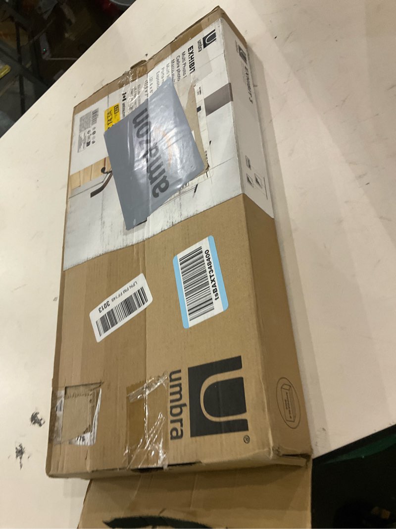 Condition photo showing As Is for Umbra Exhibit Picture Frame Gallery Set, Adjustable Collage Display for 3 Photos, Prints, Artwork and More, Holds two 4x6 and one 5x7 Photos, Black Black 3-Opening