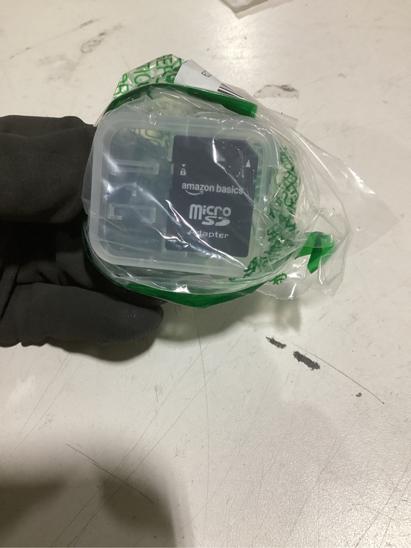 Condition photo showing As Is for amazon basics micro sdxc memory card with full size adapter, a2, u3, read speed up to 100 mb/s, 128 gb, black 128gb