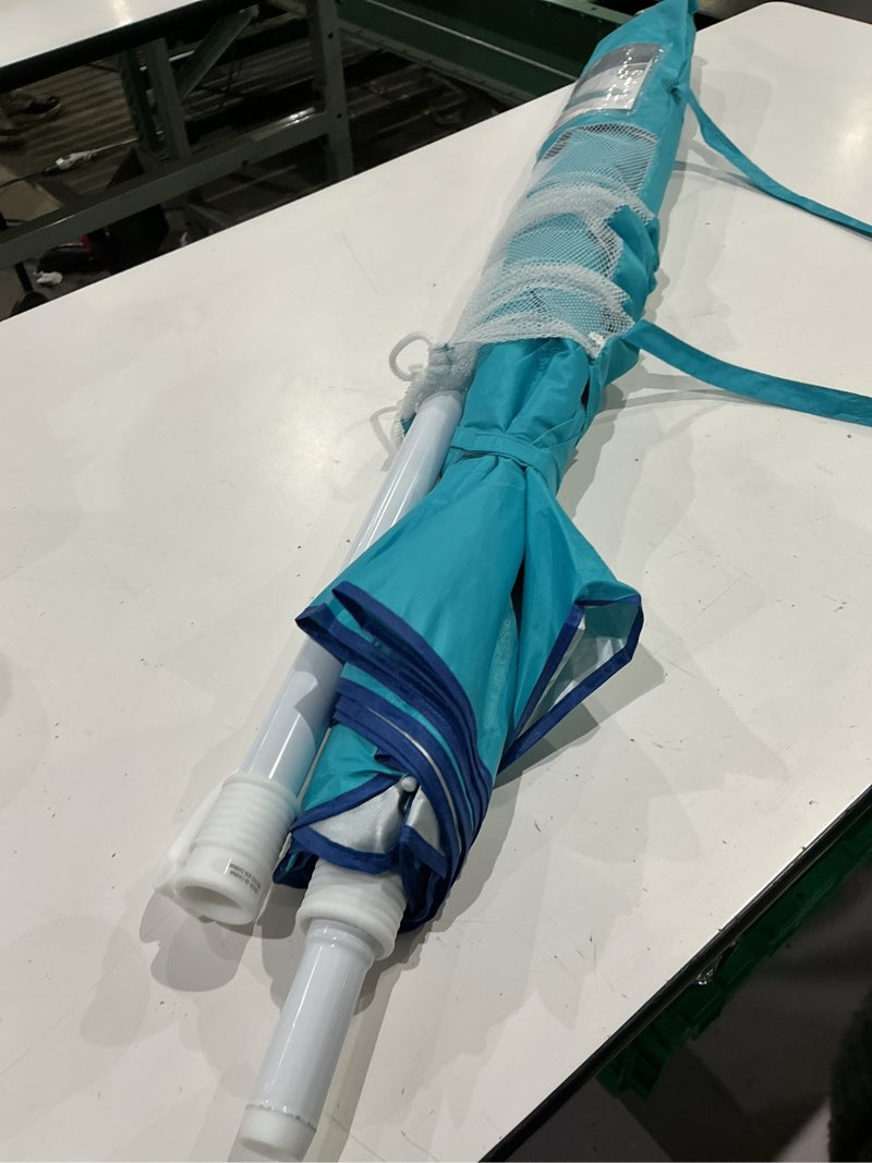 Condition photo showing As Is for mainstays 6.5' turquoise beach umbrella with tilt, uv protection