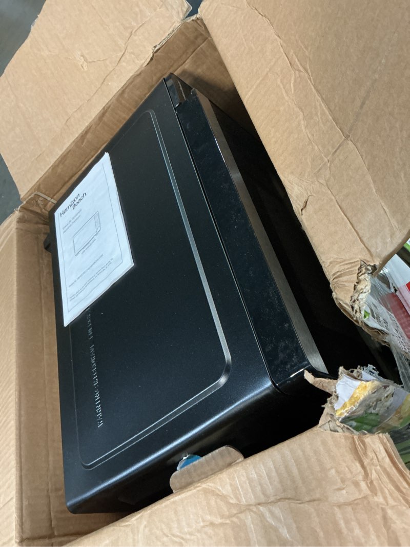 Condition photo showing As Is for hamilton beach 0.9 cu ft countertop microwave oven, 900 watts, stainless steel, new