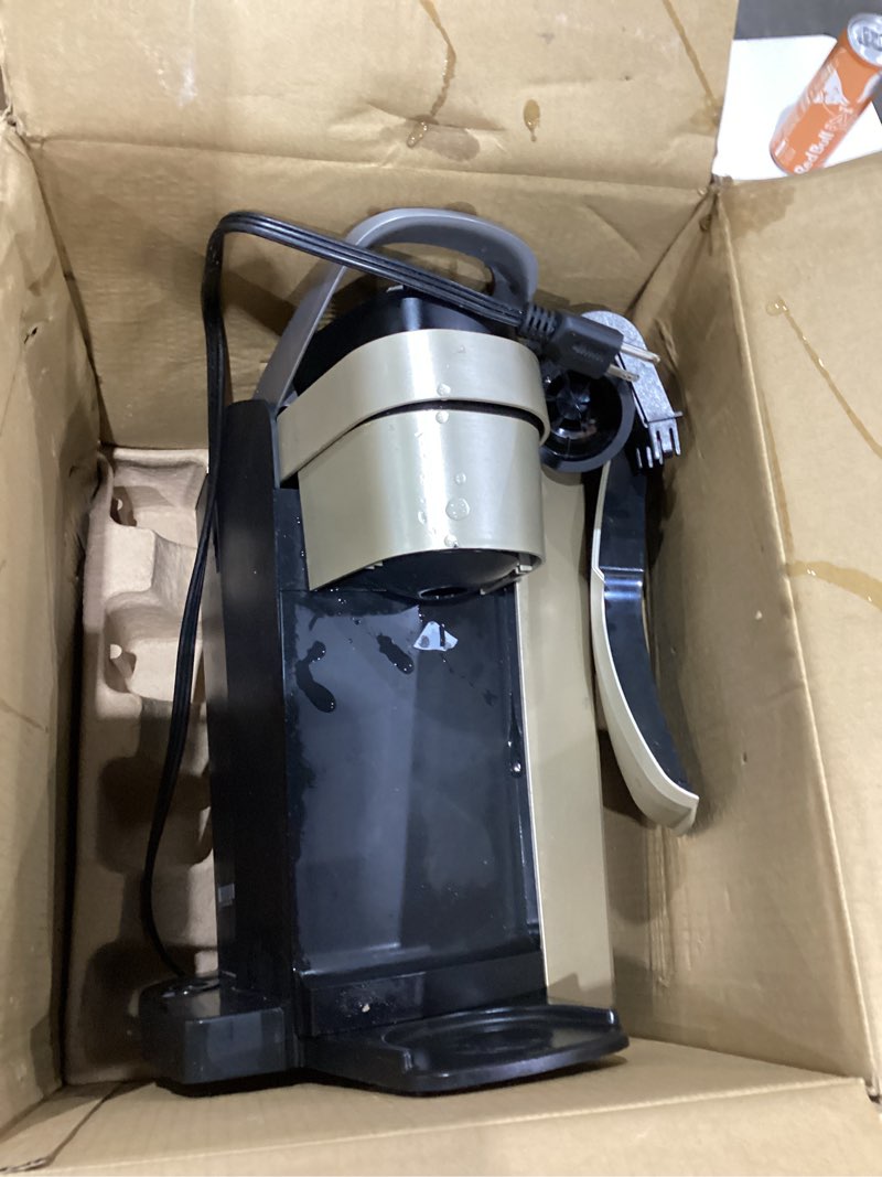 Condition photo showing As Is for keurig k-elite single serve k-cup pod coffee maker, with strength and temperature control, iced coffee capability, 8 to 12oz brew size, programmable, brushed gold
