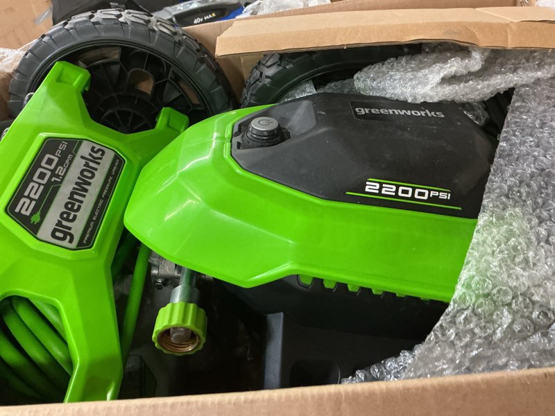 Condition photo showing As Is for greenworks 2200-psi 1.2-gpm cold water electric pressure washer with 4 spray tips