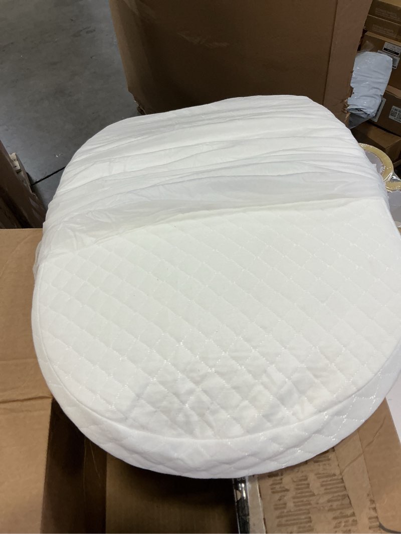 Condition photo showing As Is for waterproof oval baby bassinet mattress - waterproof exterior - thick, soft, breathable foam interior - comfy, padded design, also fits portable bassinets, white, 16 x 28 x 2 inch