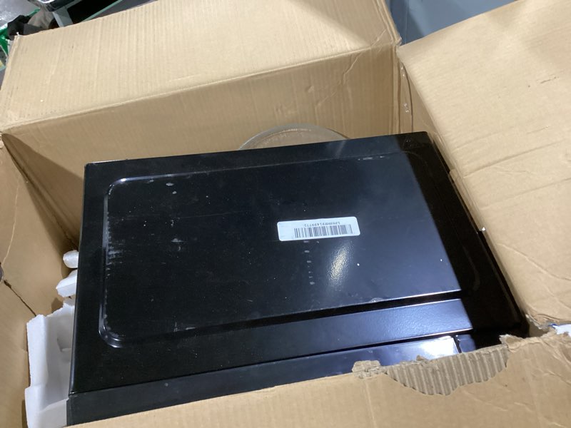 Condition photo showing Good Condition for Chefman Countertop Microwave Oven 0.7 Cu. Ft., 700 Watts with 10 Power Levels, 6 Cooking Presets with One-Touch Express Cook, Eco Mode, Child Safety Lock, & Mute Button - Black