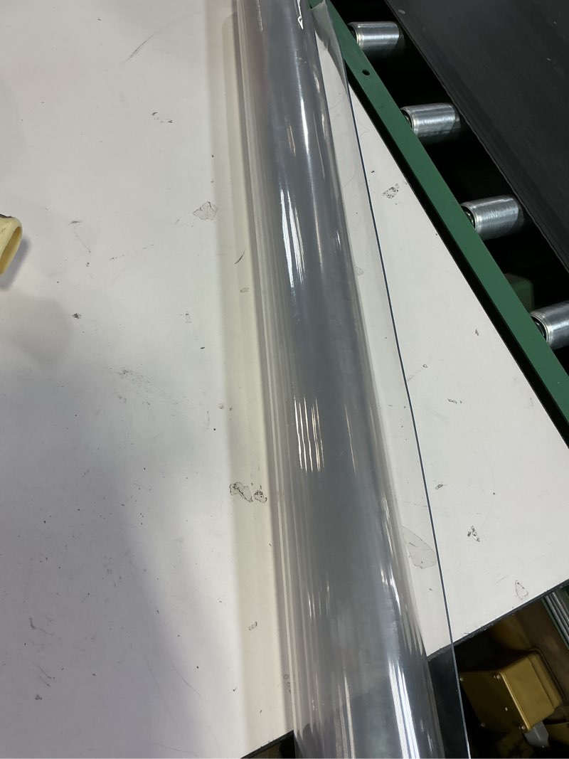 Condition photo showing As Is for Warmstar Clear Table Cover Protector 14 x 24 Inch,1.5mm Thick Plastic Table Cover Rectangle,PVC Clear Table Protector,Desk Protector Mat for Kitchen, Dresser, Writing Desk?Dining Room Table Clear 1.5mm 14" x 24" (Rectangular)