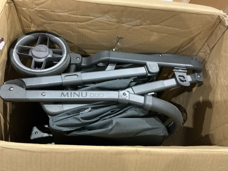 Condition photo showing As Is for wonderfold w4 elite quad stroller wagon featuring 4 face-to-face seats with 5-point harnesses, adjustable push handle, and removable uv-protection canopy, volcanic black