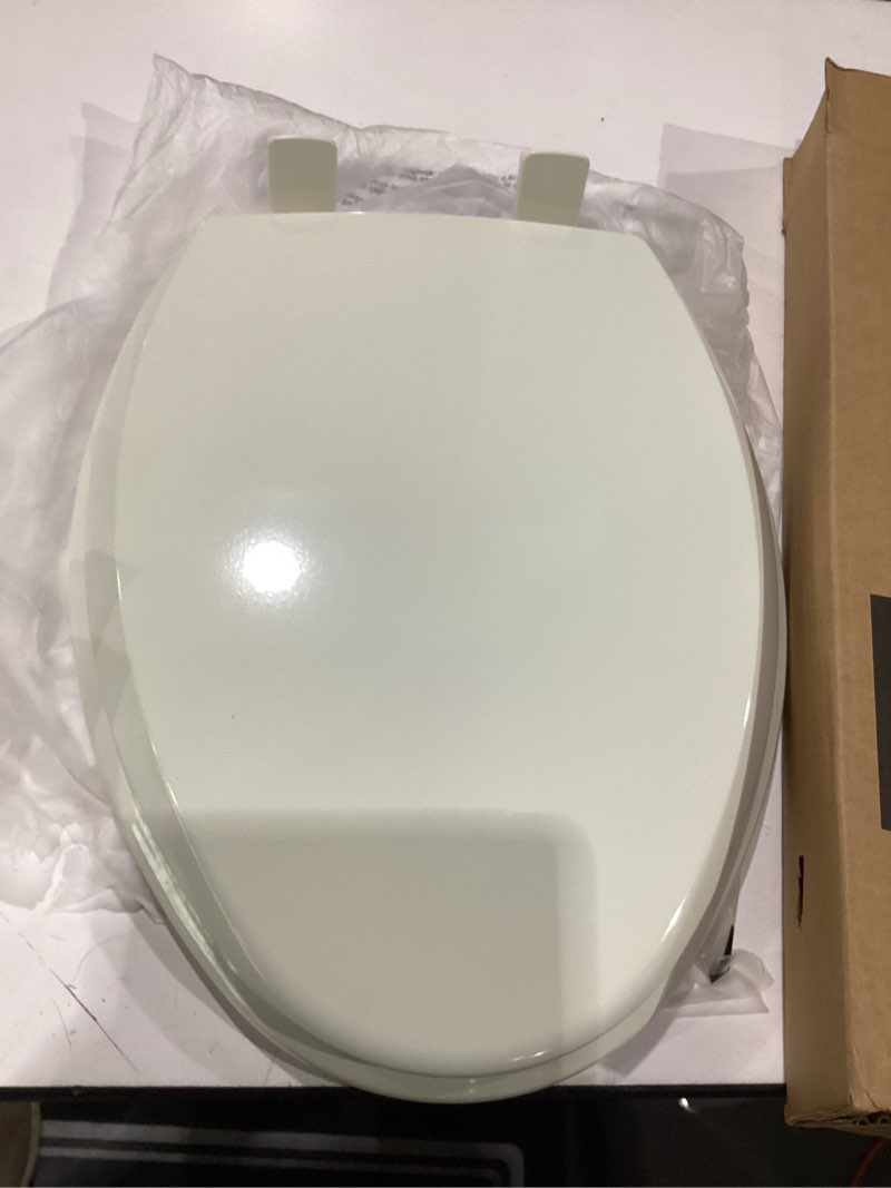 Condition photo showing As Is for mayfair cassel slow close toilet seat, easy clean, non slip premium wood seat, easy install, made in usa, elongated, biscuit seat elongated