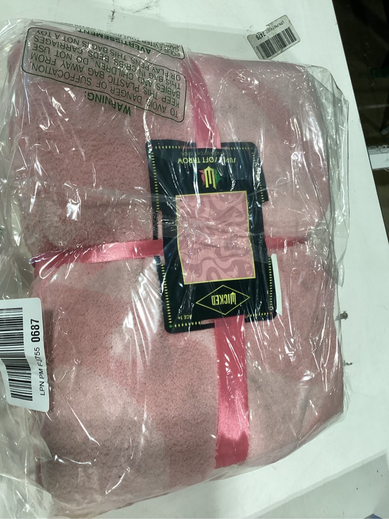 Condition photo showing New/Like New for wicked glinda paul tazewell pink bedding soft cozy feather knit intarsia throw blanket, 50 in x 60 in, (officially licensed product) by franco collectibles 50 in x 60 in wicked - glinda swirl