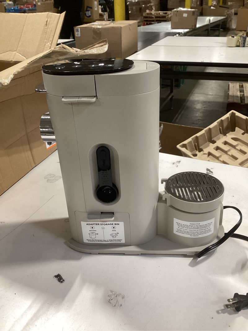 Condition photo showing As Is for Ninja Pod & Grounds Specialty Single-Serve Coffee Maker, K-Cup Pod Compatible, Brews Grounds, Compact Design, Built-In Milk Frother, 56-oz. Reservoir, 6-oz. Cup to 24-oz. Mug Sizes, Stone, PB051ST