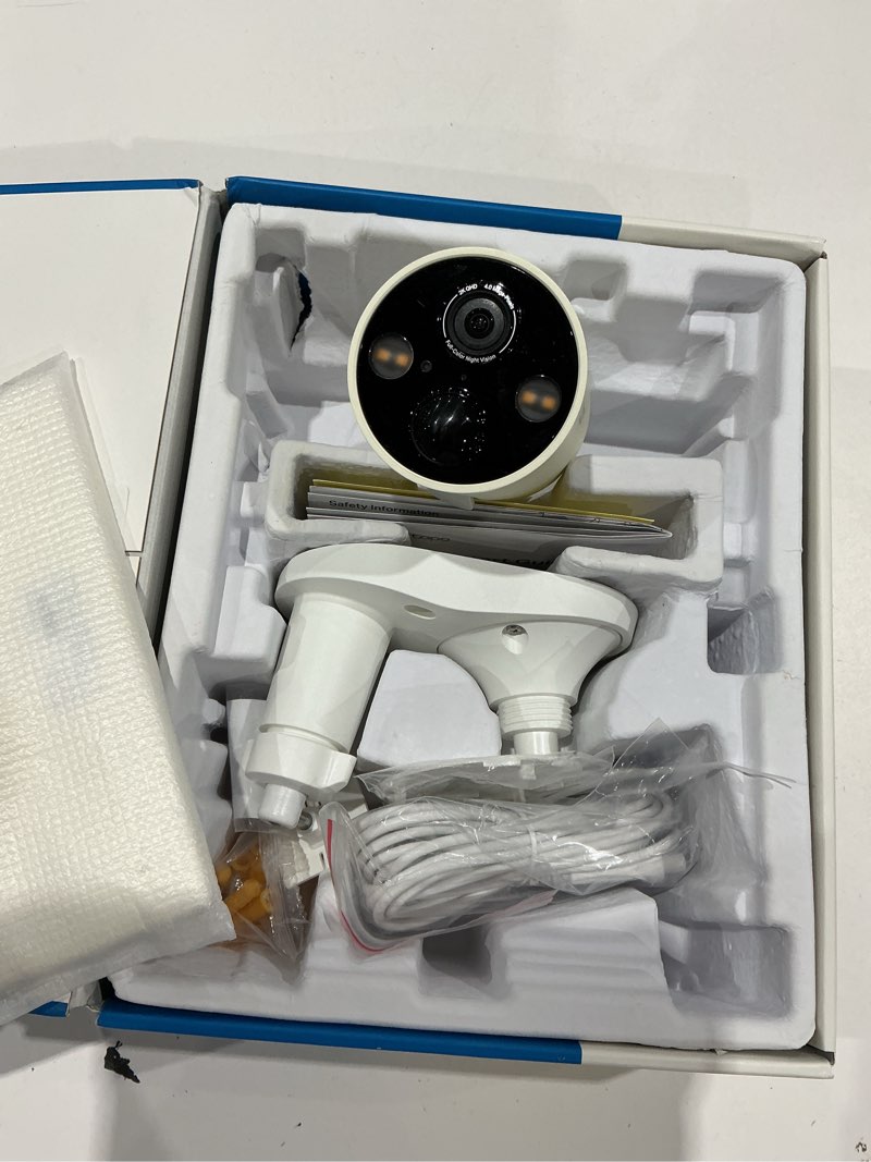 Condition photo showing As Is for tapo solarcam 2k, outdoor battery camera w/solar panel base, wireless camera, 2k qhd, 150° super-wide fov, free person/vehicle/pet detection, sd/cloud storage, starlight color night vision 2k solar powered