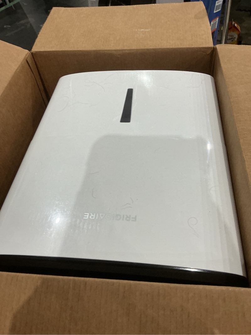 Condition photo showing As Is for frigidaire 35 pint dehumidifier, 3,000 square foot coverage, 1.7 gallon bucket capacity, continuous drain option