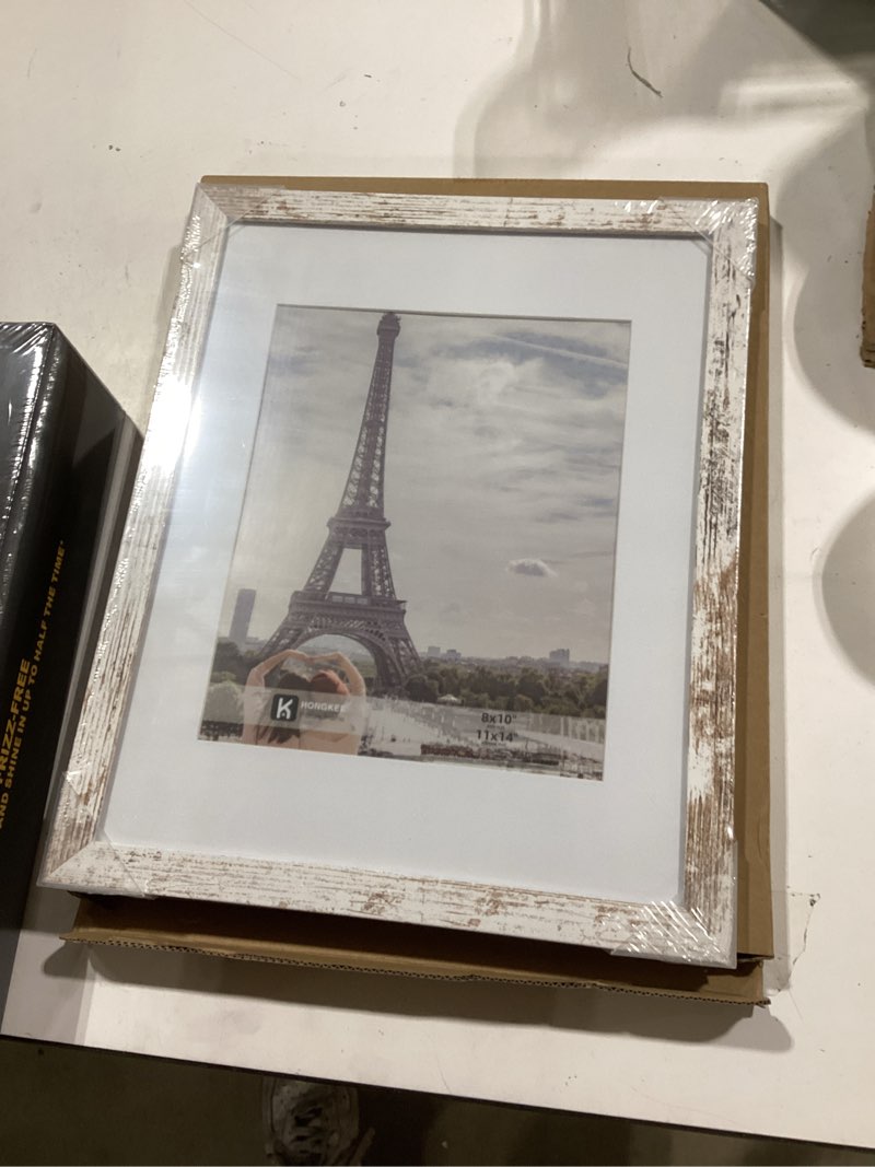 Condition photo showing New/Like New for 11x14 picture frame with real glass - 8x10 wooden frame with mat, horizontal and vertical display for wall or tabletop (distressed white, 1 pack) distressed white 11x14 in