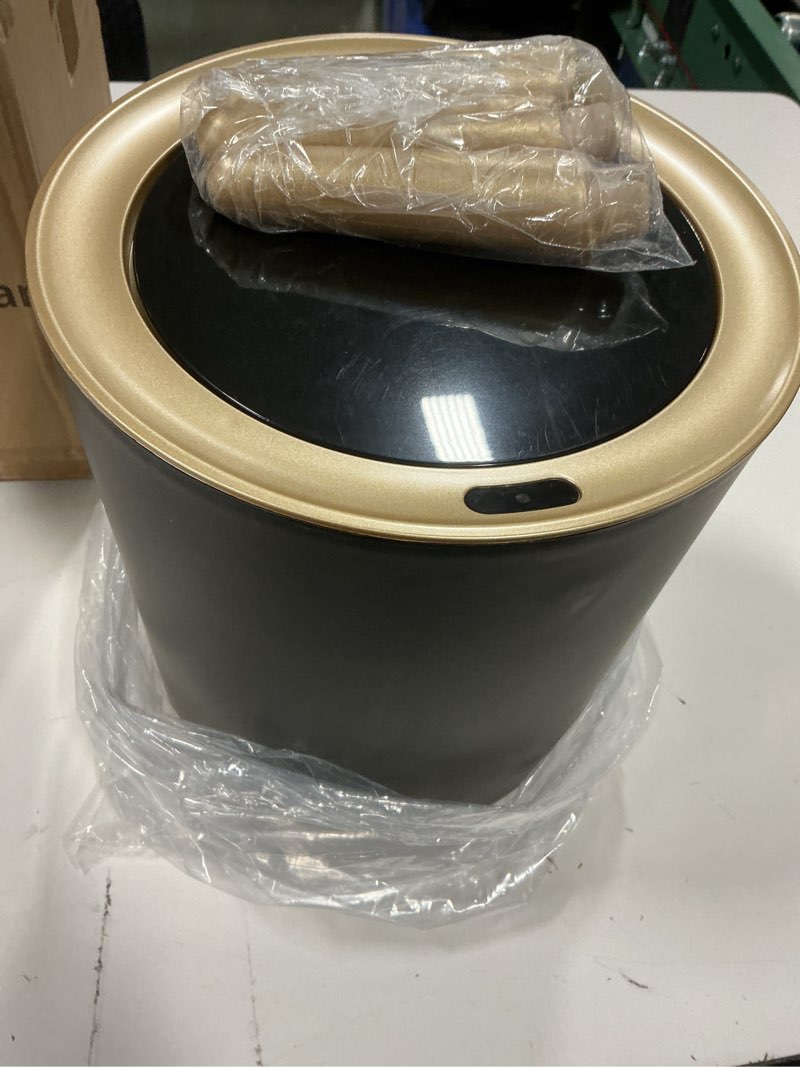 Condition photo showing As Is for Yatmung Touchless Bathroom Trash Can with Lid - Motion Sensor Garbage Can - Waste Basket for Bedroom, Living Room, Toilet, Office, Plastic - Automatic Trash Bin - Black with Gold Edge