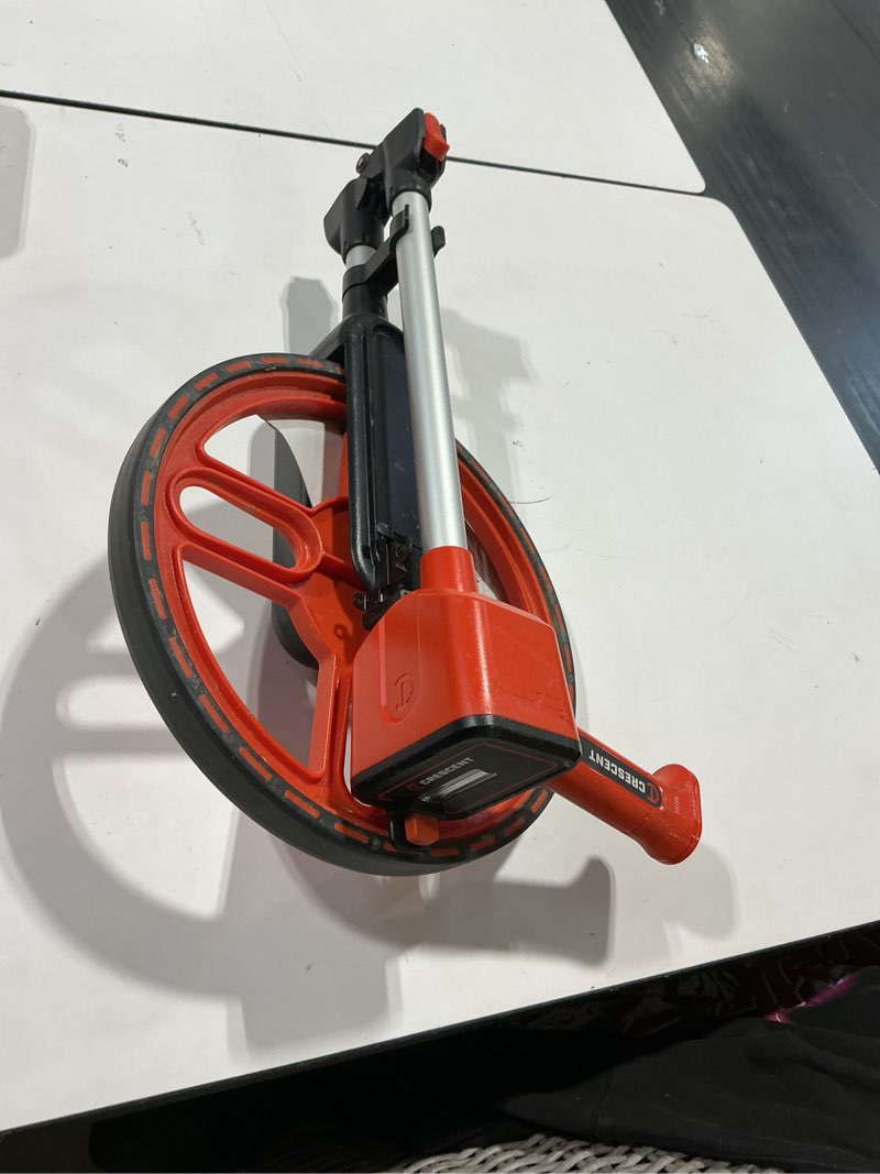 Condition photo showing Good Condition for 12 in. sae measuring wheel