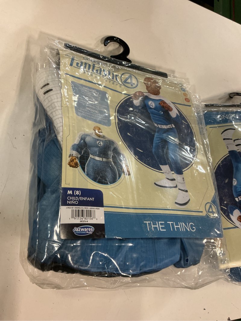 Condition photo showing New/Like New for marvel the thing official youth halloween costume - premium quality padded jumpsuit with plastic mask