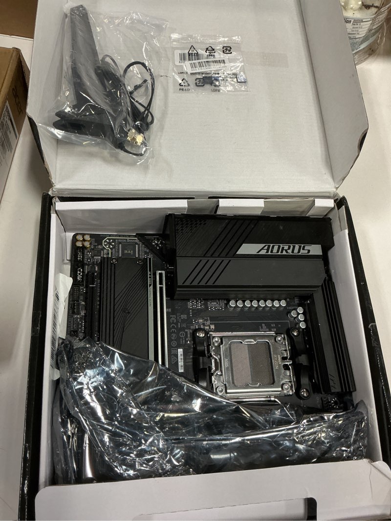 Condition photo showing As Is for GIGABYTE B650M AORUS Elite AX (AM5/ LGA 1718/ AMD B650/ Micro-ATX/ 5-Year Warranty/ DDR5/ 2* M.2/ PCIe 5.0/ USB 3.2 Gen2X2 Type-C/Intel 2.5GbE LAN/Q-Flash Plus/EZ-Latch/Gaming Motherboard) mATX B650M|AE|M.2 x2|WIFI6