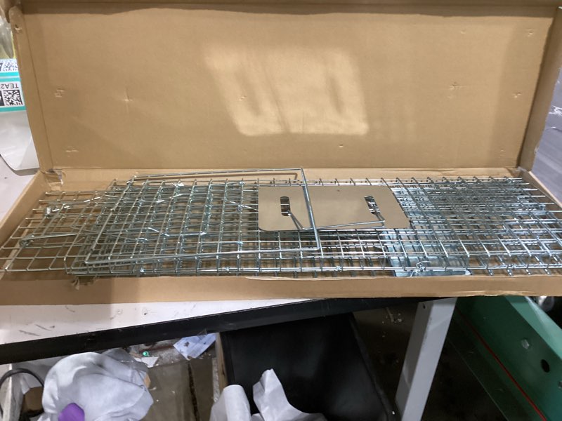 Condition photo showing Good Condition for universal small animal live capture trap, 24-inch humane cage, heavy-duty galvanized steel mesh, suitable for small raccoons, small wild cats, marmots, squirrels, skunks, and moles