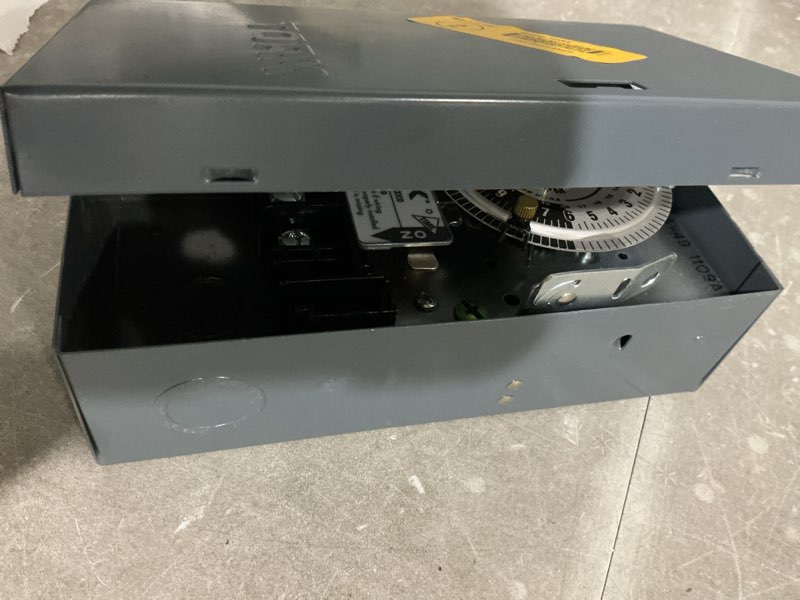 Condition photo showing As Is for tork 40 -amps 120/277-volt indoor programmable digital lighting timer