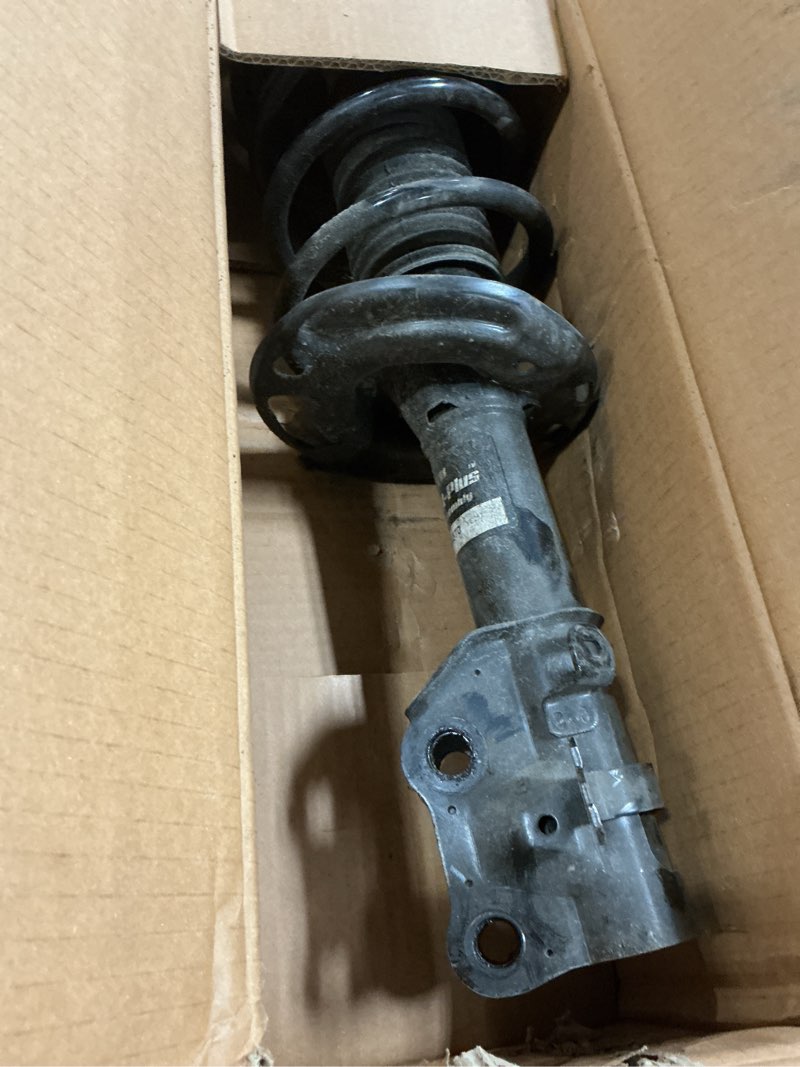 Condition photo showing As Is for kyb sr4571 strut-plus complete corner unit assembly -strut, mount and spring