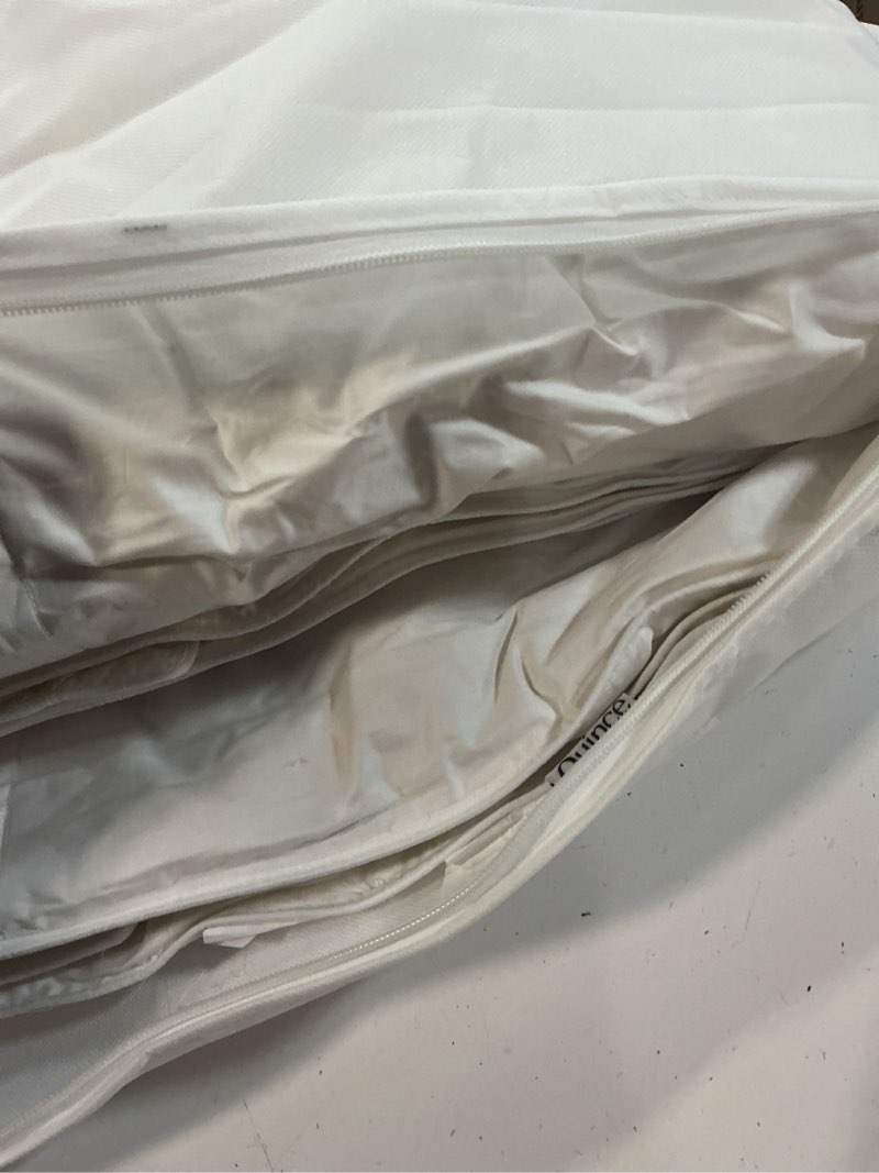 Condition photo showing Good Condition for premium down comforter, twin, down